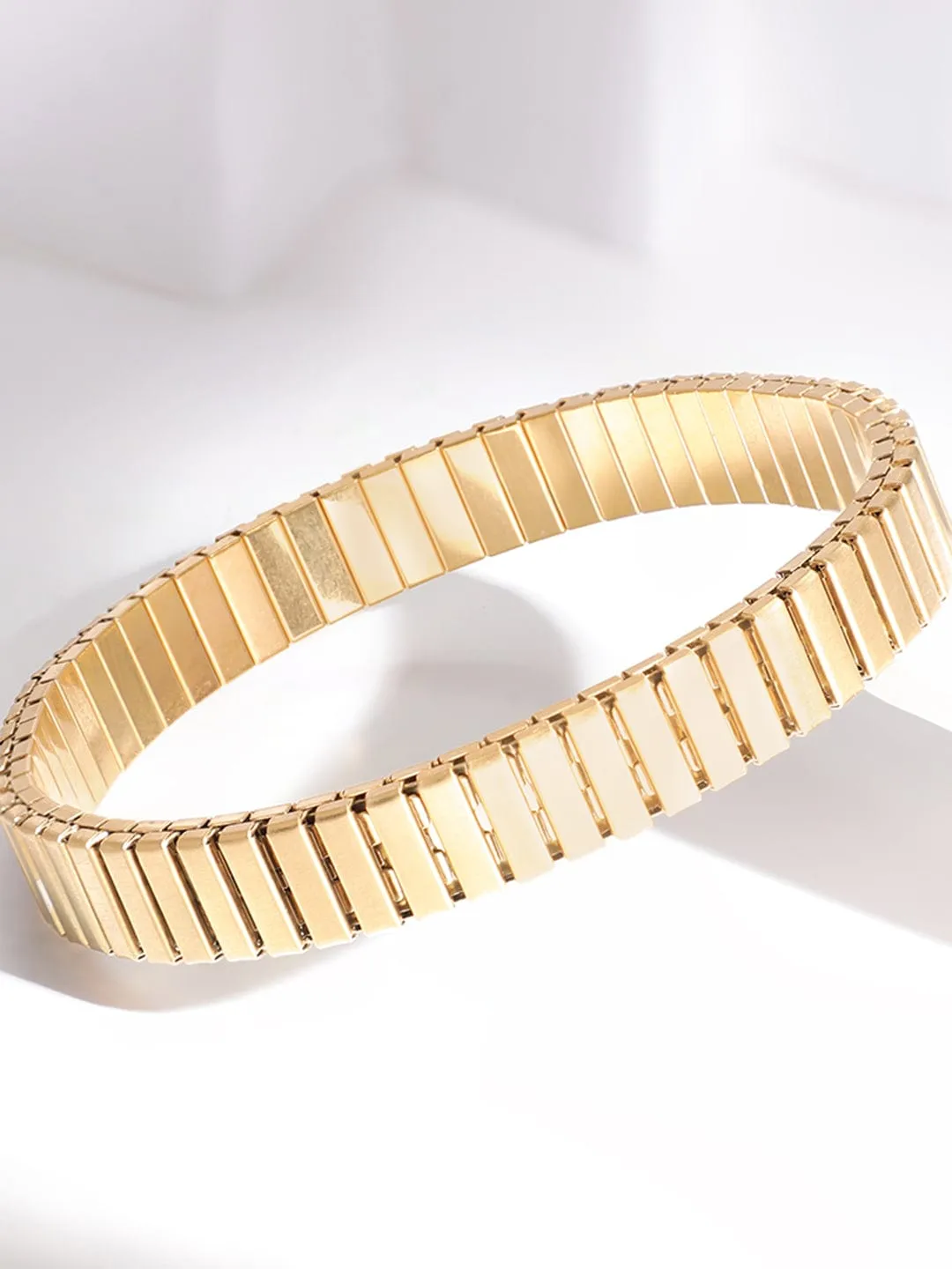 Rubans Voguish Stainless Steel  18 KT Gold Plated  Tarnishfree Waterproof  Solid Bangle Styled Bracelet